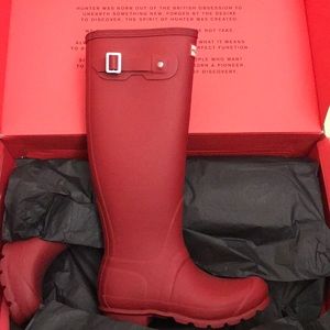 Hunter military red tall boots.